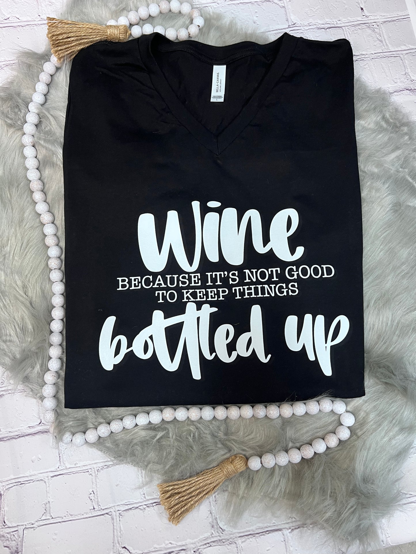 Wine, because it’s not good to keep things bottles up