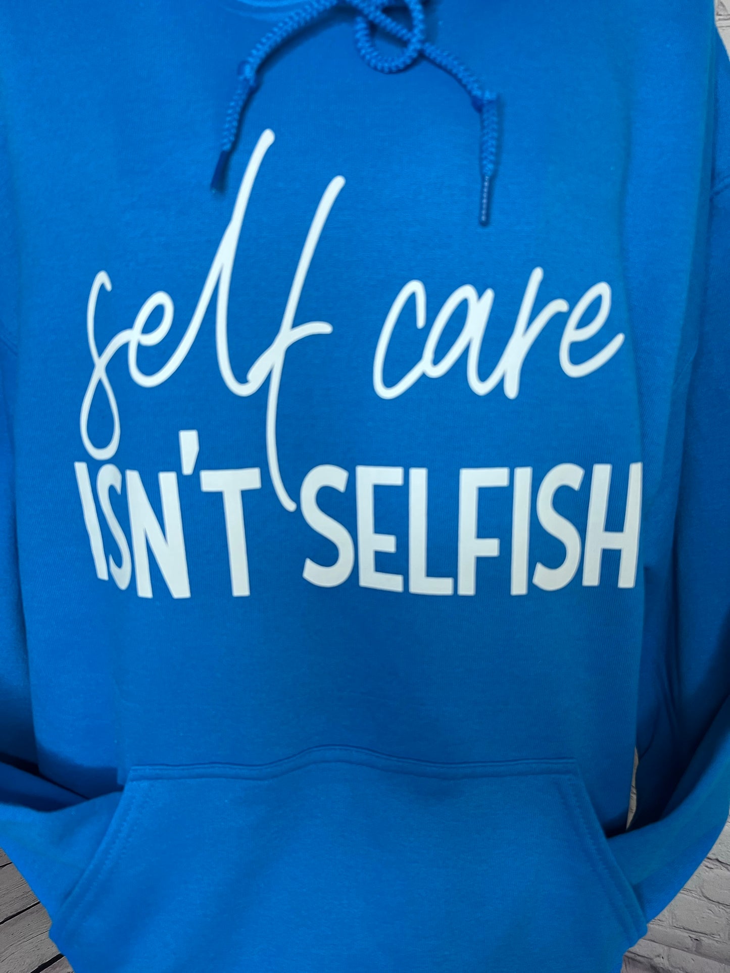 self care ISN’T SELFISH turquoise hoodie
