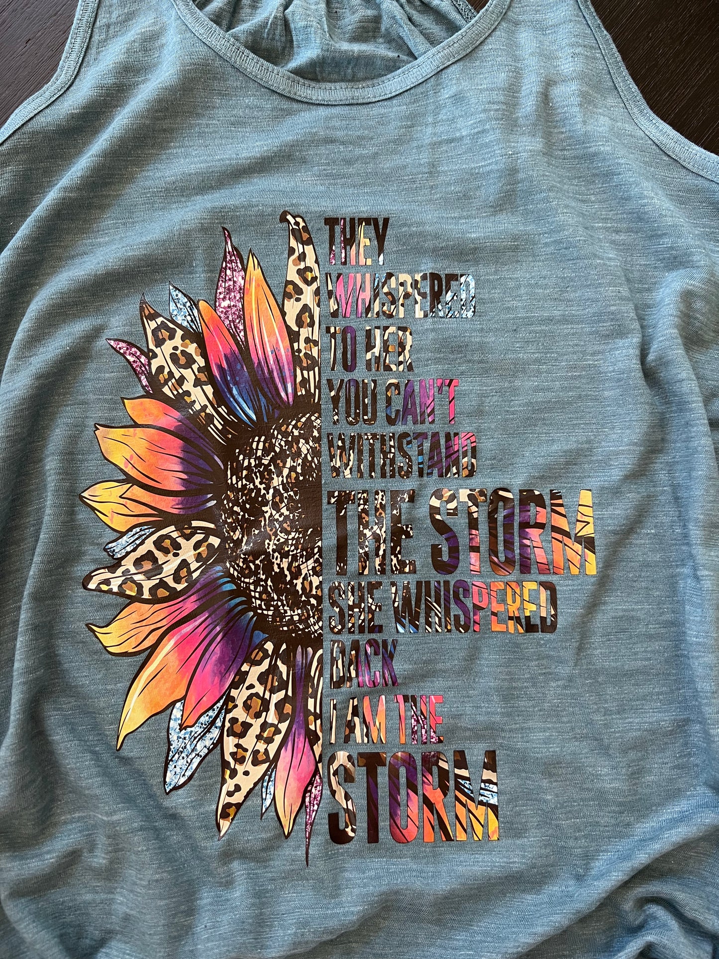 She is the storm screen print racer back tank top